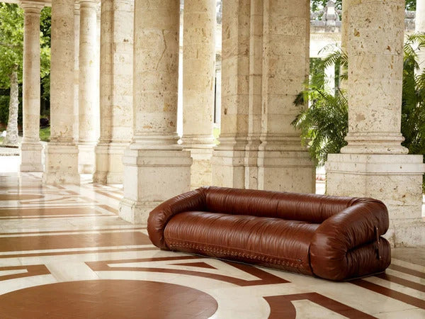 Anfibio Sofa styled in a contemporary living room, emphasizing its sculptural presence.