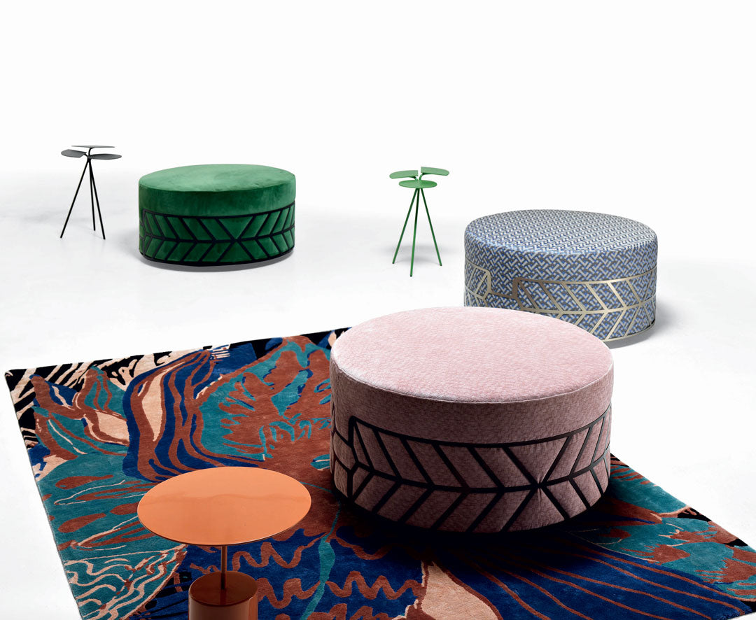 Set of four ottomans with mixed fabrics