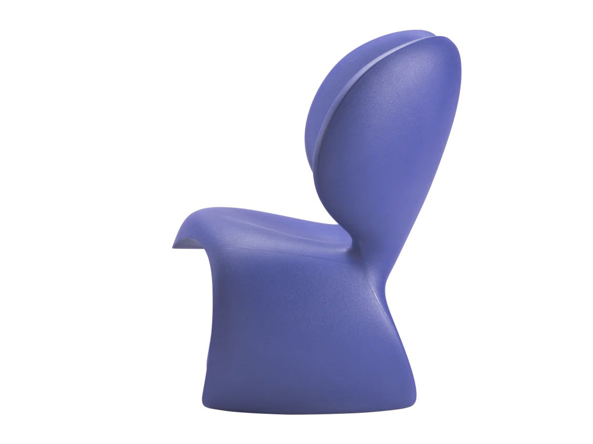 Side profile of the Don't F**k With The Mouse Armchair in recyclable polyethylene, sculptural contemporary design by Ron Arad.