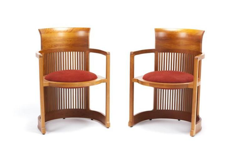 Wooden armchairs with red cushions