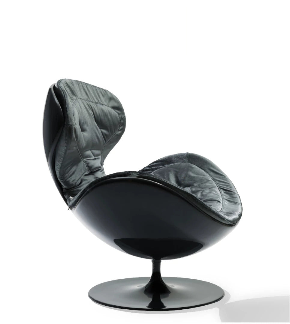Side profile of the Jetsons Armchair showing its sculptural space‑age silhouette.