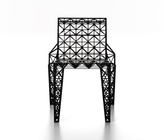 Lanuda stackable dining chair by Alias, laser‑cut aluminium structure, black finish, Italian contemporary design by Riccardo Blumer.