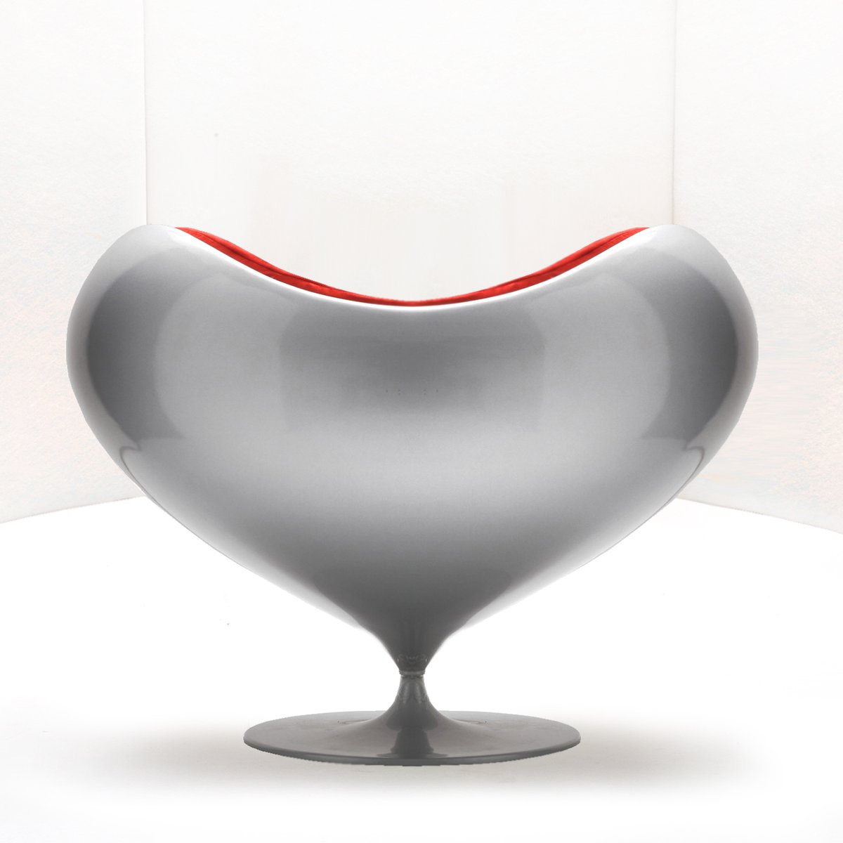 Back profile of the Love Armchair showing its rounded, enveloping silhouette.
