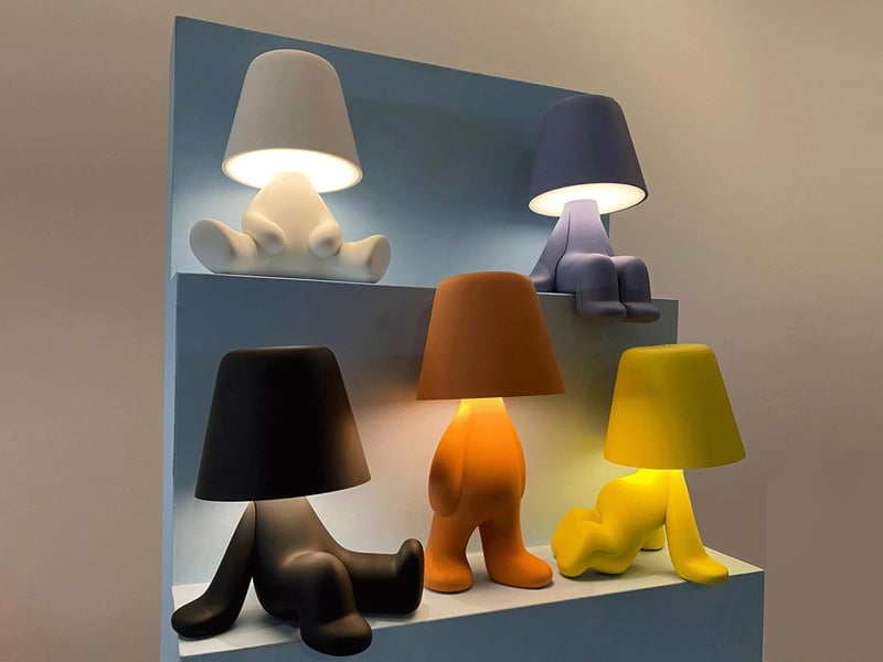 Sweet Brothers Tom portable LED lamp adding warm ambient light and playful character to modern interiors.