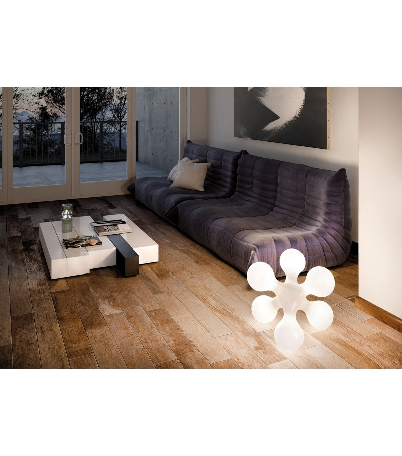 Modern living room with purple sofa