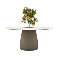 Modern outdoor dining table with stone-like silhouette Qeeboo