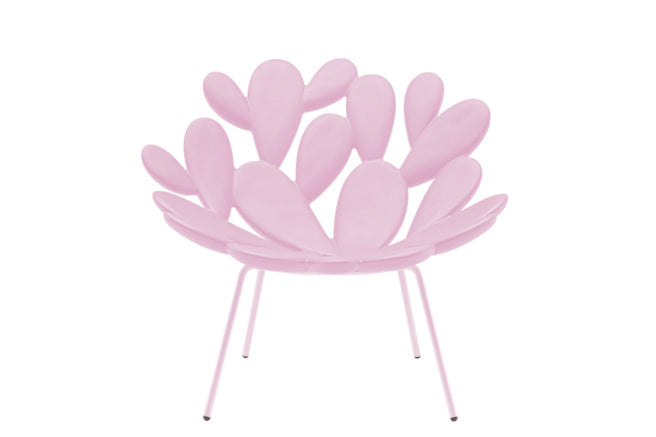 Pink Qeeboo Filicudi armchair with a unique design on a white background