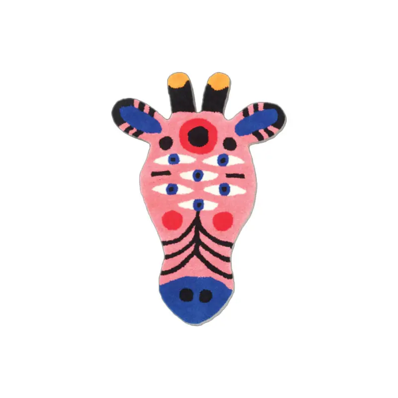 Gira Carpet Shaped M by Qeeboo, giraffe‑inspired rug designed by Marco Oggian