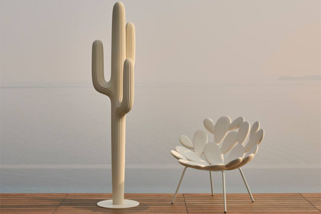 Mediterranean designer armchair with sculptural silhouette