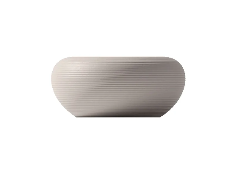 Close‑up of Nami Low Table by Qeeboo showing sculptural wave texture