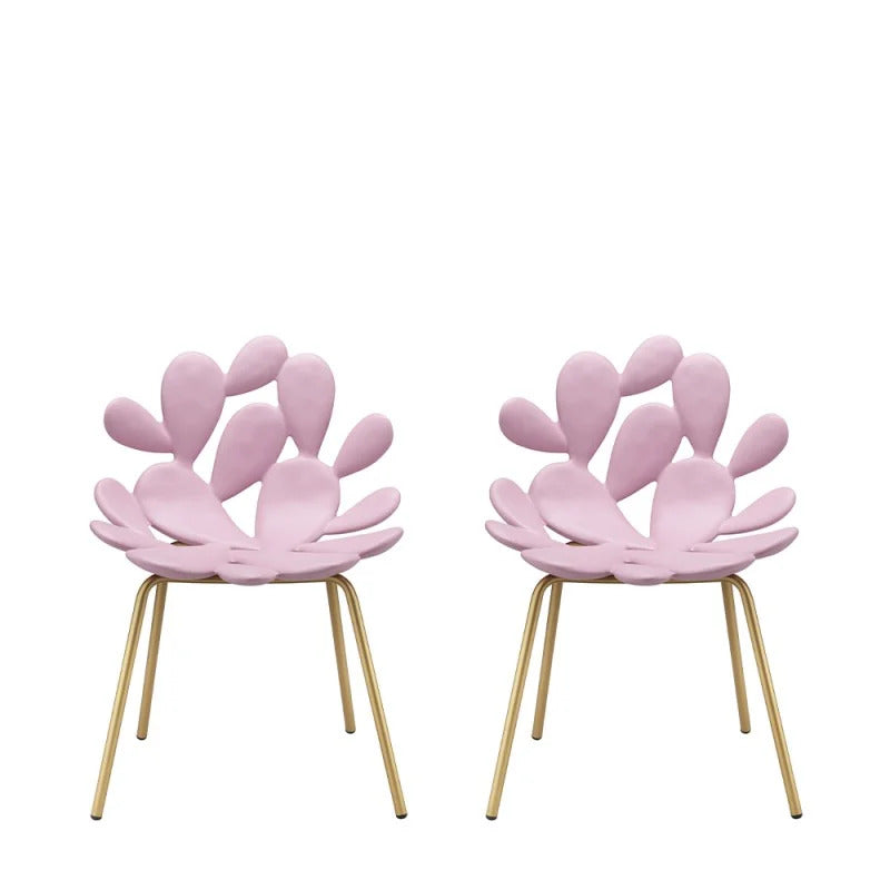 Two Filicudi matching modern dining chairs with sculptural light pink flower-shaped seats and brass metal legs by Qeeboo