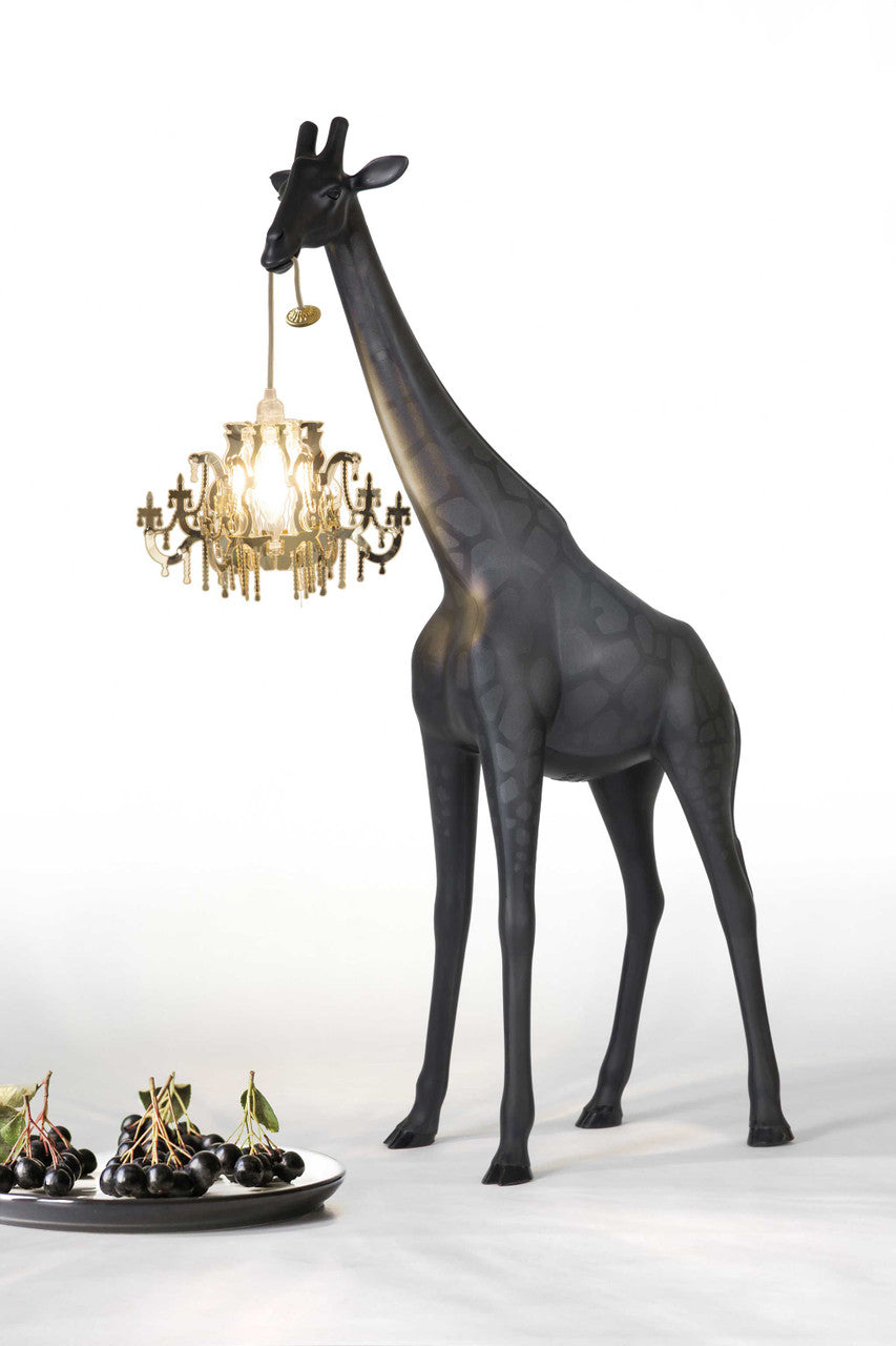 Qeeboo Giraffe in Love XS collection shown in artistic and home environments